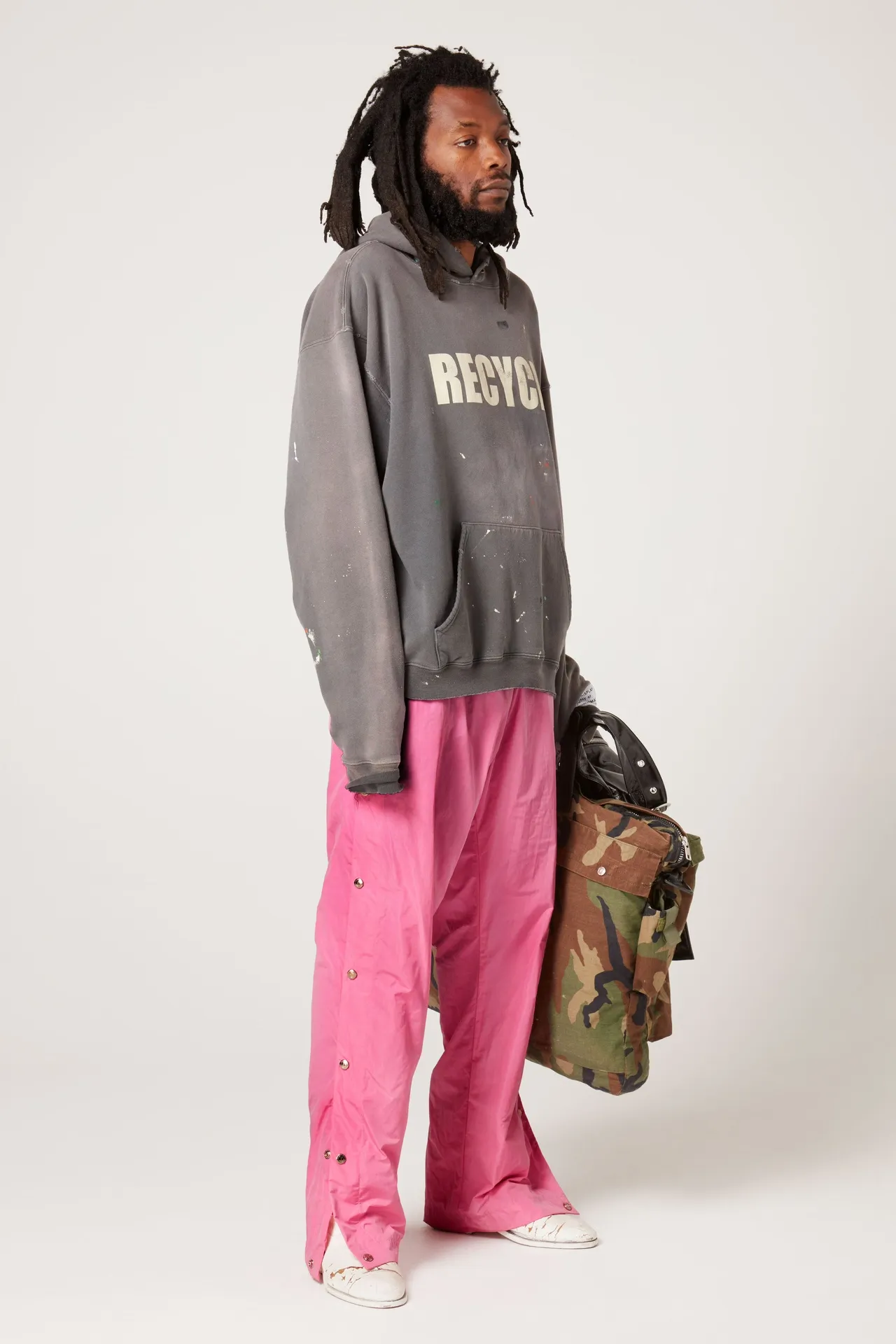 GALLERY DEPT. 90'S RECYCLE HOODIE WASHED BLACK 90'S washed hoodie with distressed eco-friendly slogans. Washed black S-XL. Ready-made garments are washed and dyed again. Multiple spots throughout the body are spray-faded. The ribs are cut and worn.